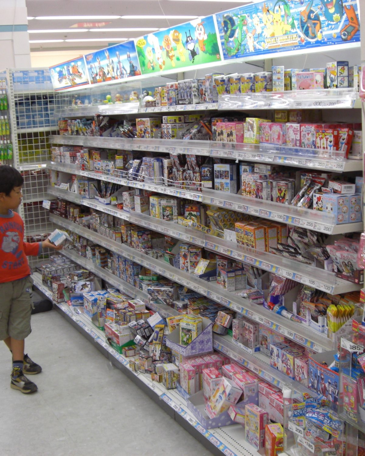 Shelves stocked with home goods at Panda Mart